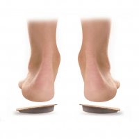 Asymetrical heel pads